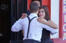 Buenos Aires, Argentina (2014) | Tango dancers outside of a restaurant in La Boca. Performers eagerly dances tango and takes photos with you for tips.