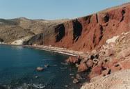 Santorini, Greece (1998) || Santorini, Greece (1998) || The red beach on Santorini. It is red because of the colorful volcanic rocks. I visited Greece twice, this trip to Santorini was on my second time to Greece. Where the island located is actually a dormant volcano. Many centuries ago, there was an explosive eruption, and formed a lot of islands in that region, Santorini is one of them. In fact, if you look from above, Santorini's shape is like volcanic cone without the top.