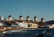 Mykonos, Greece (1996) | The famous 5 windmills standing on the Greek island of Mykonos. I joined a Hong Kong tour by myself. In the tour, I met a boy traveling with two girls, they are about the same age as me, so we kind of do the sightseeing together as if I was part of the group. I remember I was looking at this windmills and thought this is so beautiful, I wish I was travelling with someone.