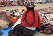 Sacred Valley, Peru (2009) | Woman with double pigtails at Chinchino Sunday Market.