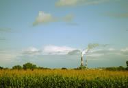 some farm in Montana, United States (2008) || Toward the end of our South Dakota trip. We were driving back to ND via Wyoming and Montana. I spot this field with the factory in the bottom. My travel companion was Richard in this trip. I love this picture.