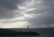 Hawaii, United States (1997) | Traveled to Hawaii with Frank on a cruise, one cloudy and rainy late afternoon as we were departing from one of the islands to another, I stole a shot of the lighthouse. The clouds were very dramatic.